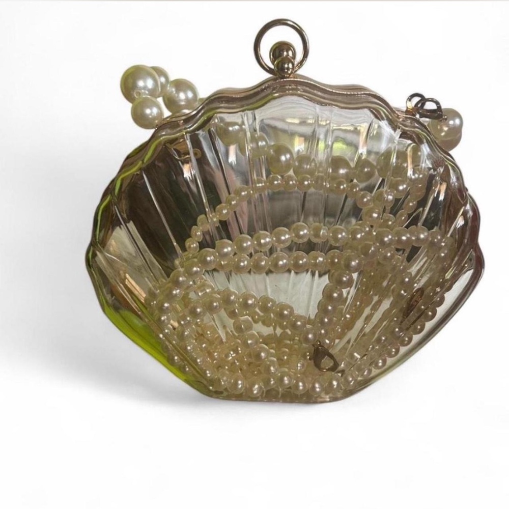 Pearl shell clutch bag